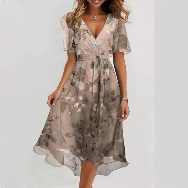 Woman wearing a floral dress on a white background